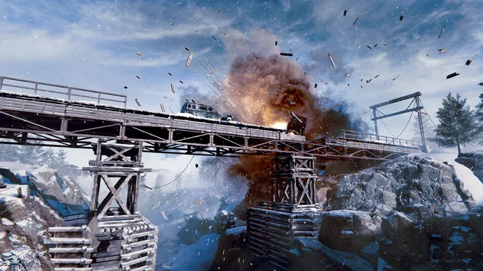 Wooden trestle bridge exploding under a convoy in a snowy valley