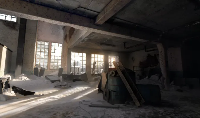 Snow-drifted ruined factory hall with glass-block windows