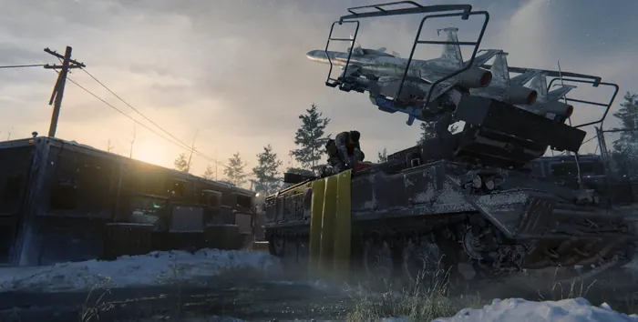 Snow-covered anti-air vehicle position at dusk in a war-torn suburb