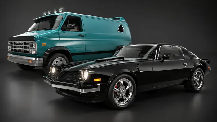 Retro teal custom van and black muscle coupe, studio pair