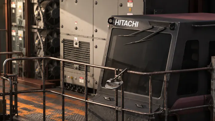 Industrial machinery cab close-up with wiper and rivet detail
